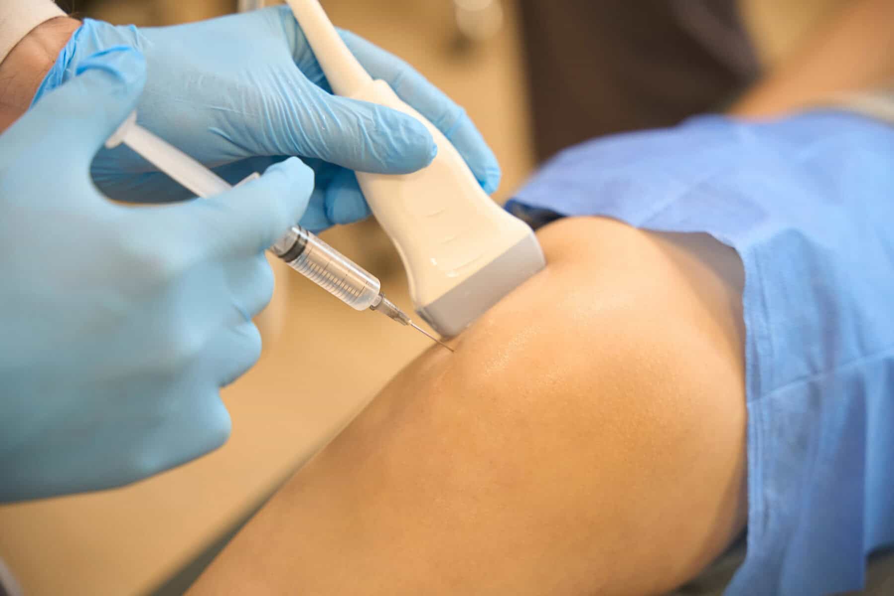 - syringe-injection-into-shoulder-orthopedic-pain-treatment.jpg.