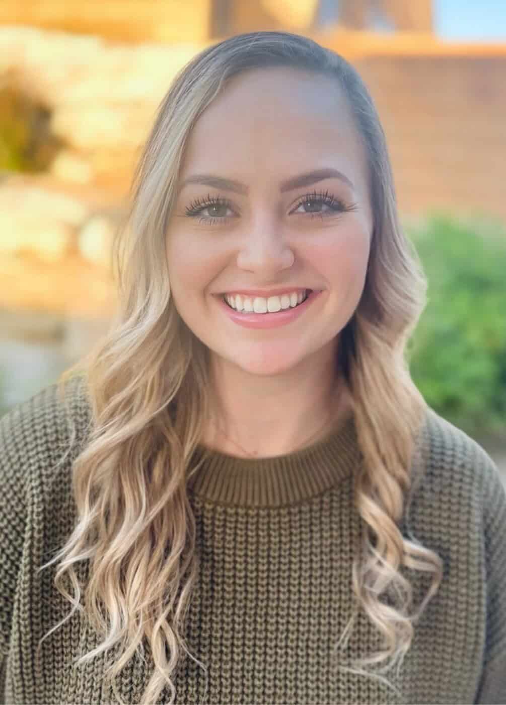 IMG_4592 Healthy smiling woman outdoors, promoting regenerative health services in St. George, Utah.